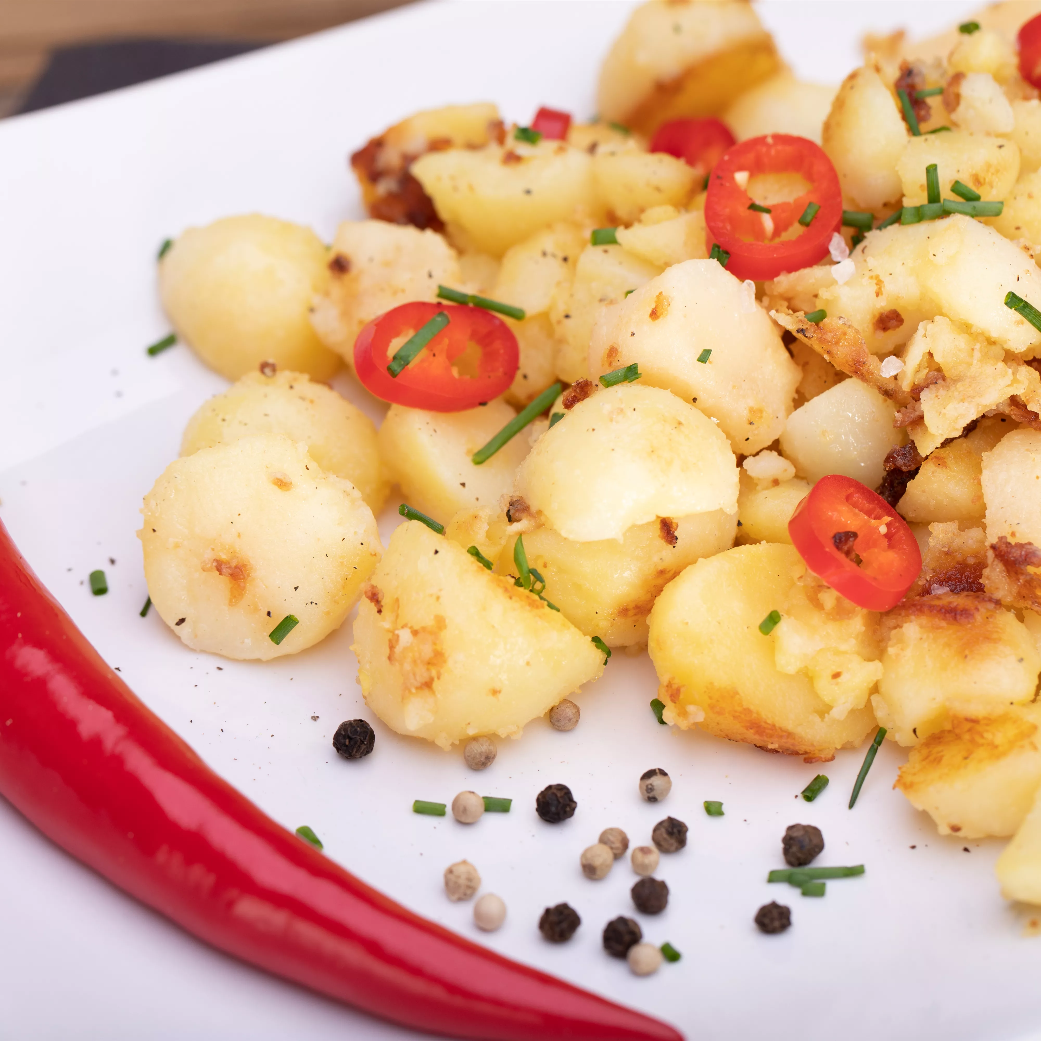 Rezept des Monats Dezember 2025: Chilikartoffeln – die scharfe Beilage